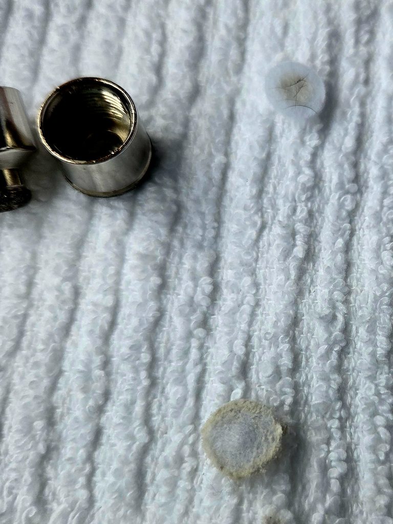 Used microdermabrasion filter after facial exfoliation treatment